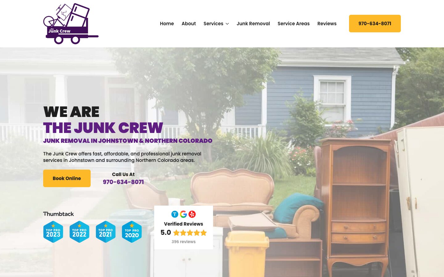 The Junk Crew homepage on a laptop